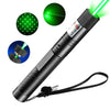 A black portable laser pointer training torch with a green laser beam and accessory components shown.