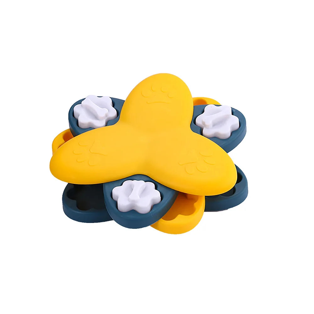 A yellow interactive puzzle slow feeder bowl with white inserts for dogs and cats.