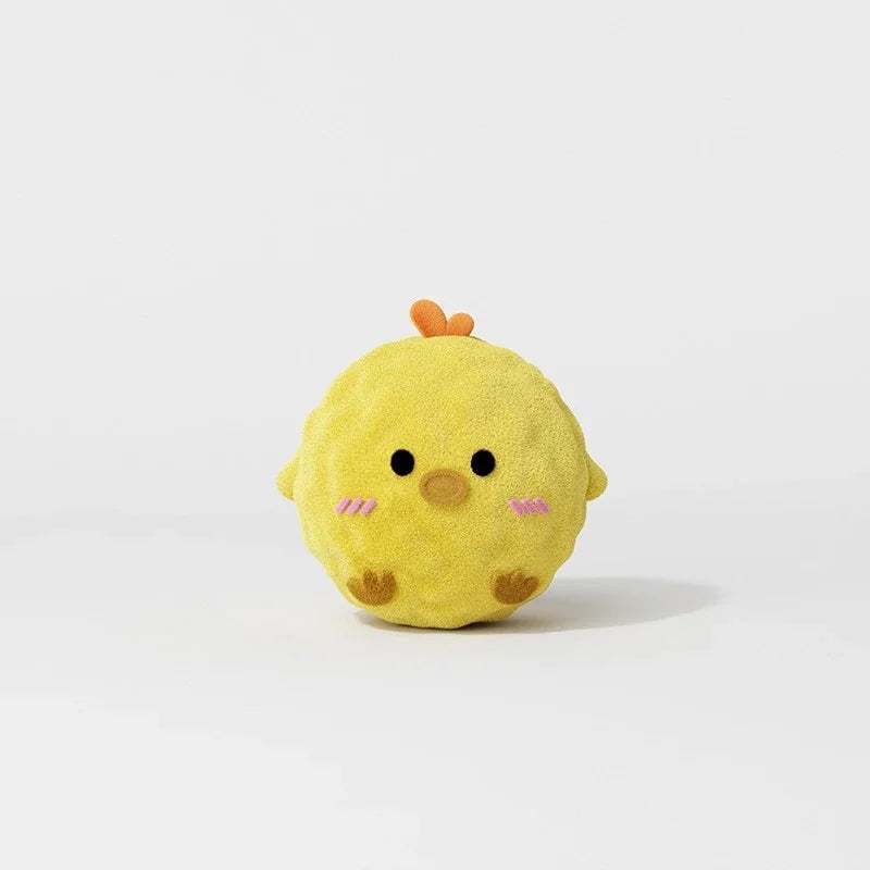A yellow squeaky hedgehog plush dog toy with a spiky ball.