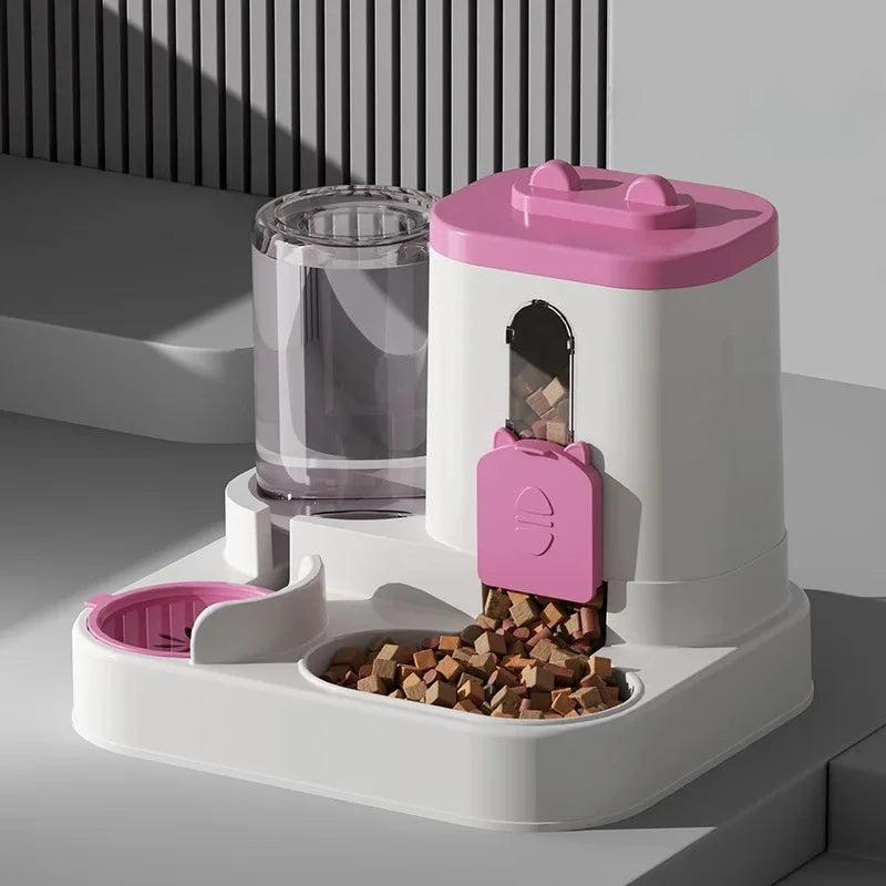 A white and pink gravity pet food and water dispenser with a transparent water tank and a feeding compartment for kibble.