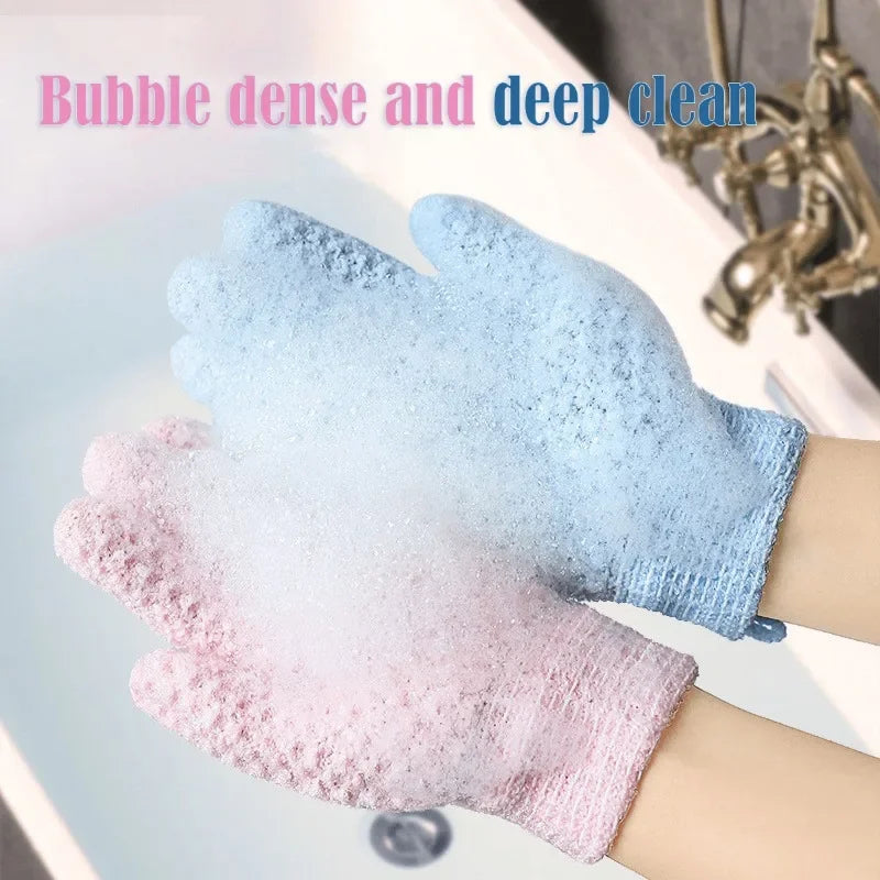 A hand wearing a light blue exfoliating shower glove is shown, emphasizing bubble density and deep clean.