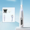 A white portable dog grooming trimmer is shown next to its components, including a hair comb and a power cord.