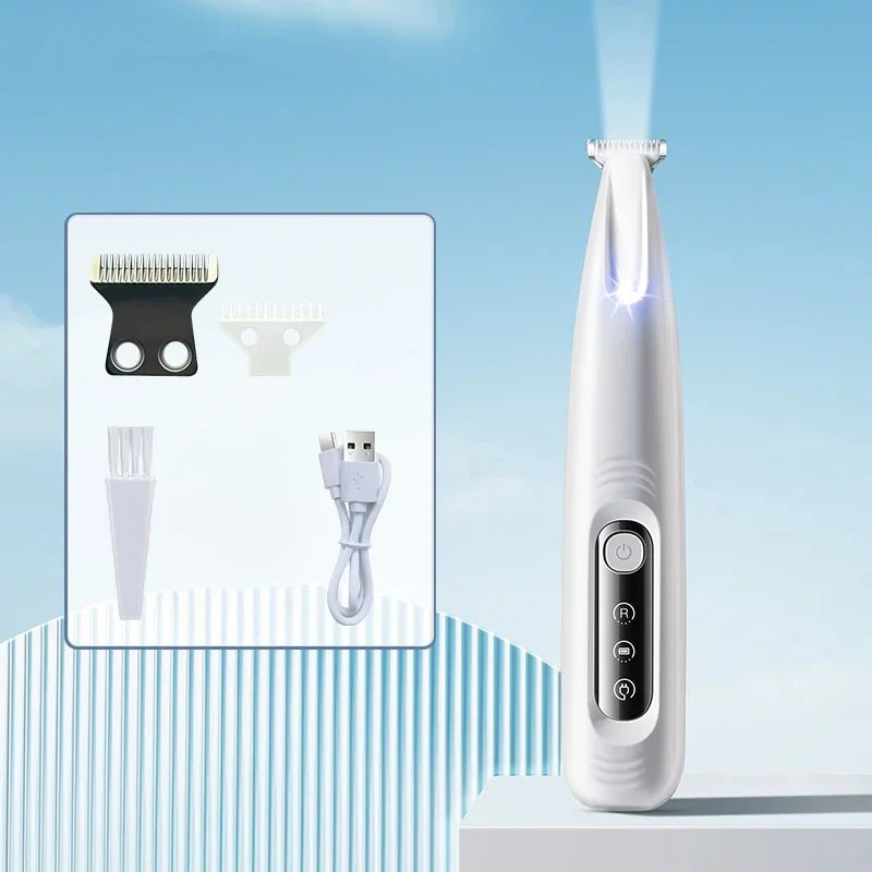 A white portable dog grooming trimmer is shown next to its components, including a hair comb and a power cord.