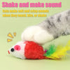 A plush mouse cat toy with a red body, white paws, and a yellow feather tail is shown against a light green background.