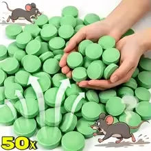 A hand holds a pile of green peppermint rodent repellent balls with a mouse.