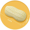 A light yellow, peanut-shaped squeaky dog toy is shown against an orange background.
