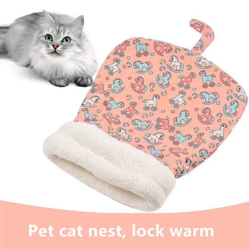 A pink patterned cat nest with a white towel inside, designed to lock in warmth for pets.