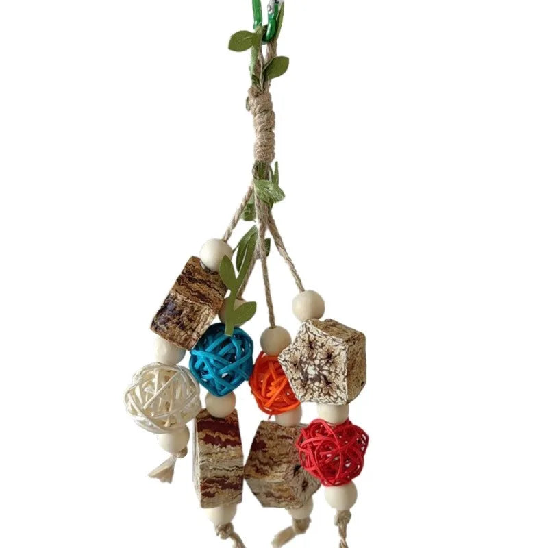 Stainless steel parrot chew toy with accent cups hanging from a natural fiber string.