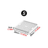 A white rectangular pet litter box with a grid pattern and a black letter S symbol above it.