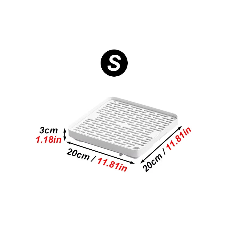 A white rectangular pet litter box with a grid pattern and a black letter S symbol above it.