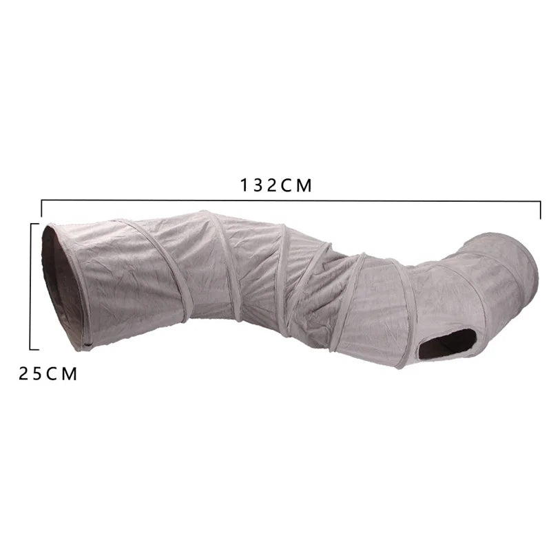 A light gray foldable S-shape cat tunnel with a suede finish, shown in profile.