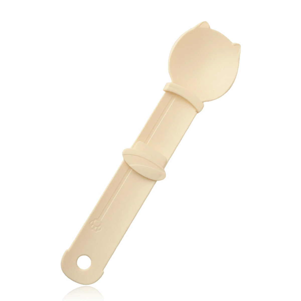 A beige squeeze spoon feeder for liquid cat treats, shown from the side.