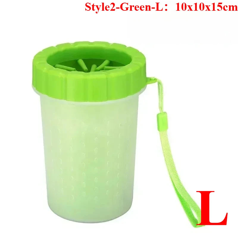 A lime green portable paw washer cup with a silicone bristled top and a green cord.