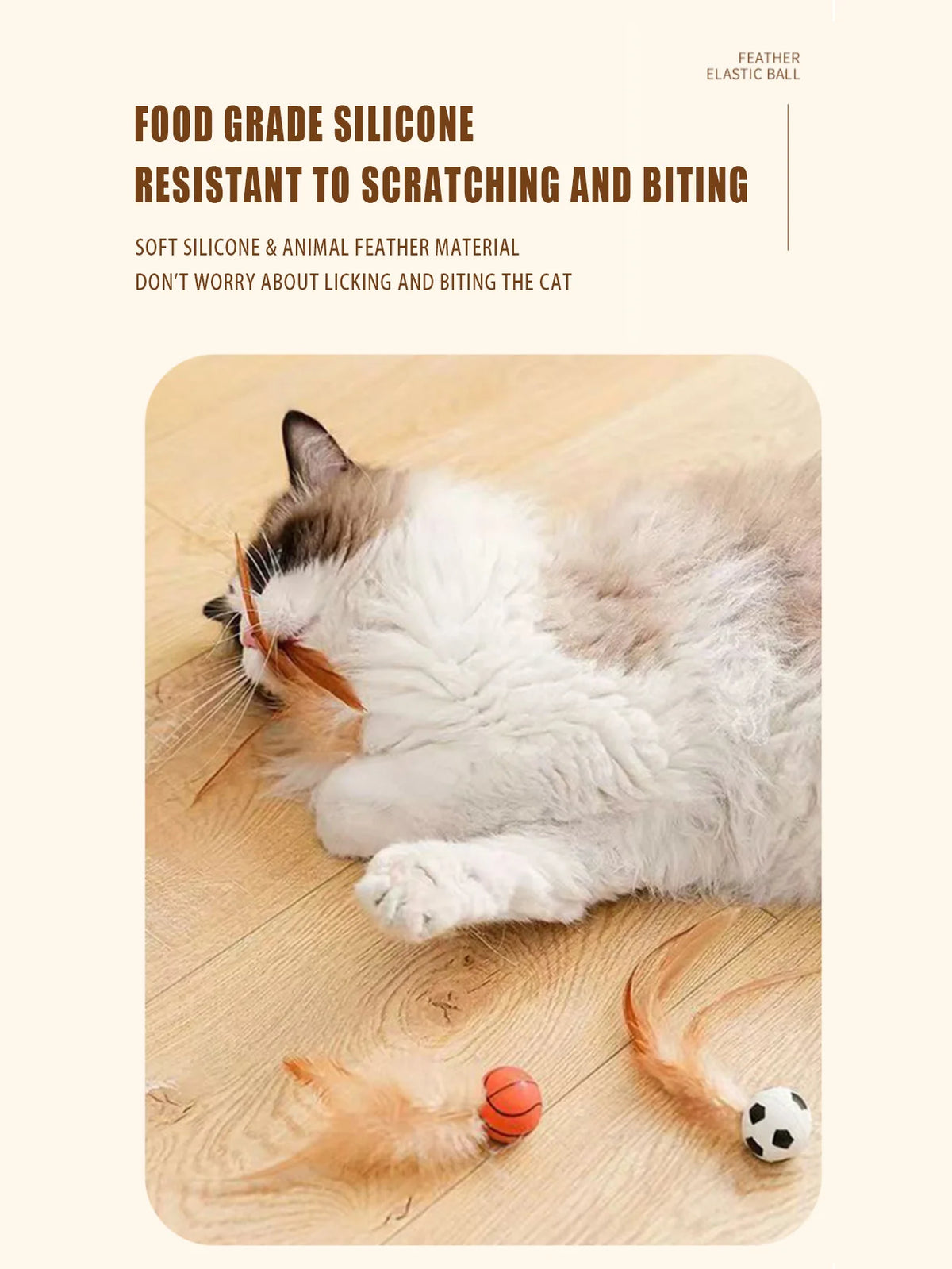 A fluffy gray and white cat is lying on a wooden floor near three feather elastic balls.