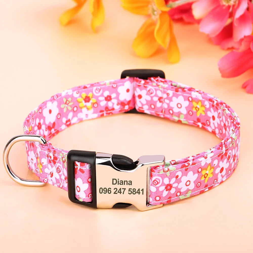 Pink floral print dog collar with a silver buckle and an engraved name tag