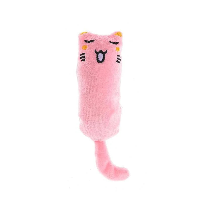 Rosa Katzenspielzeug in Form einer schlafenden Katze mit geschlossenen Augen und Schnurrhaaren.
