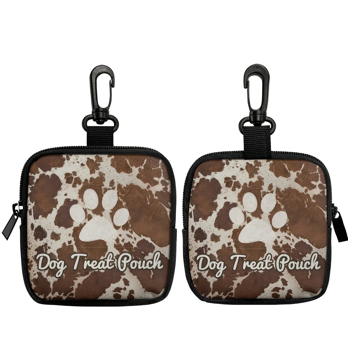 A brown and white cow print dog treat pouch with a black clip and strap.