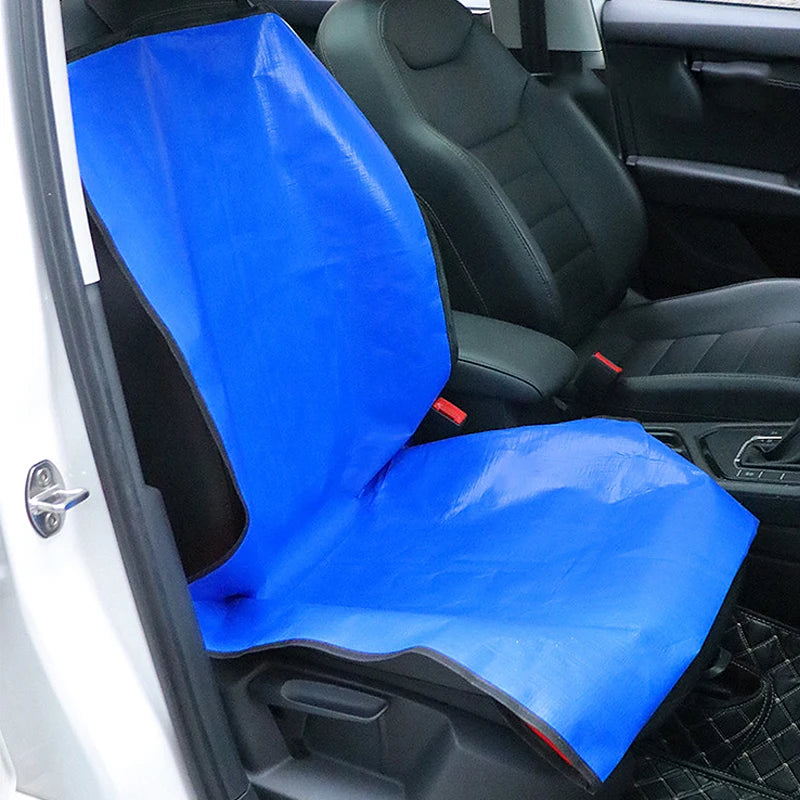 Blue waterproof car trunk mat with a pet barrier installed in a vehicle interior.