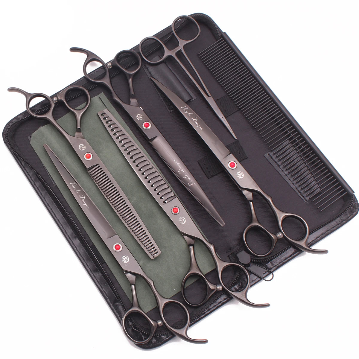 A set of professional stainless steel pet grooming scissors laid out on a black case.