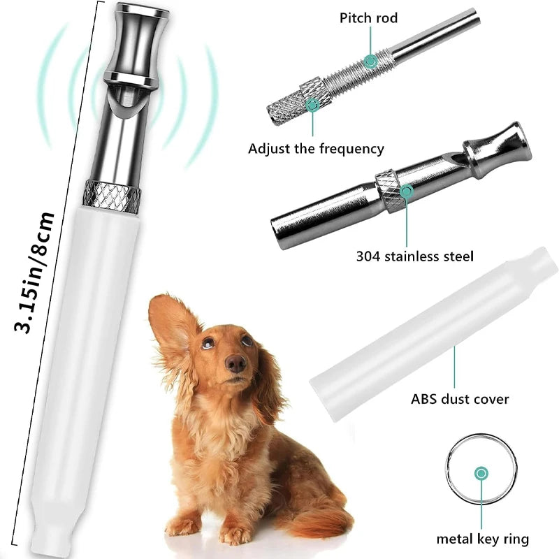 A white ultrasonic dog whistle with a silver pitch rod and an ABS dust cover shown next to a small dog.