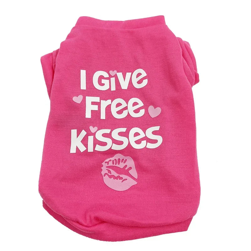 A bright pink cotton dog vest featuring a graphic of a kiss mark.