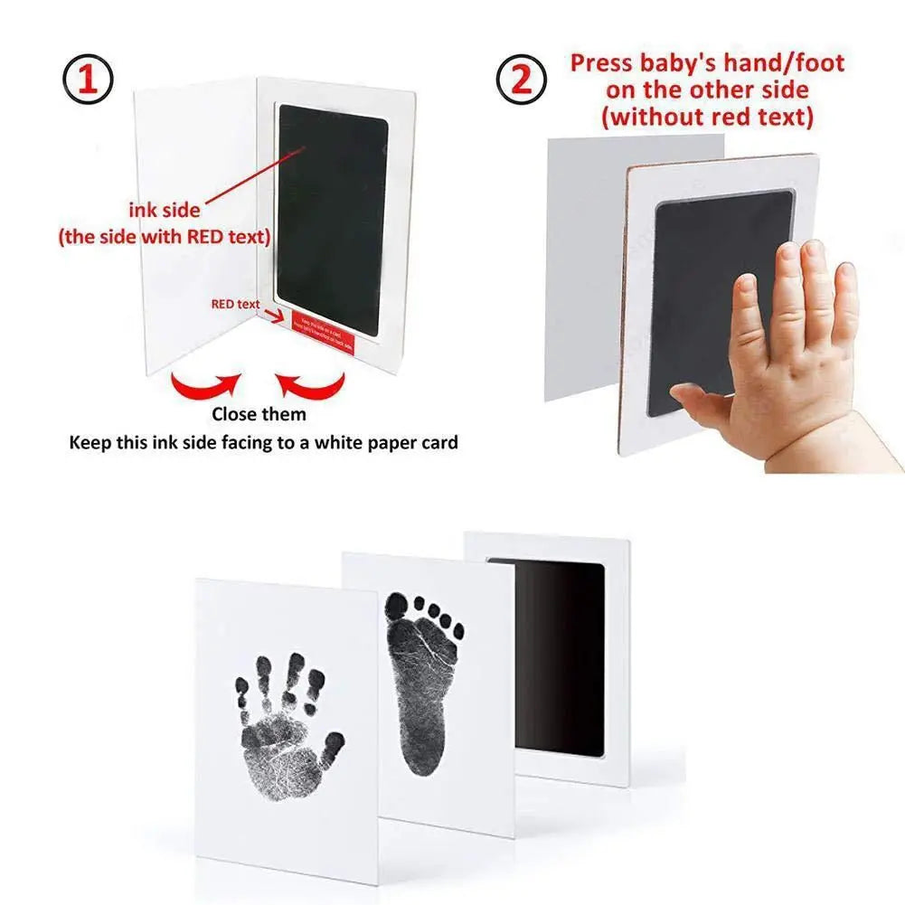 A set of cards showing a baby's handprint and footprint on the ink side for crafting