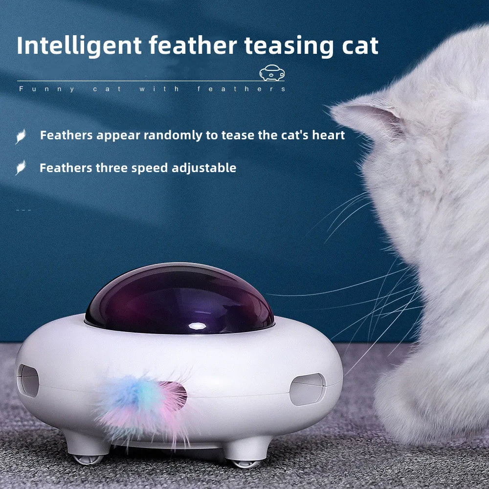 Weiße intelligente UFO-Katze Spielzeug, das ein pinkes Federchen aus dem Gerät hervorzieht.