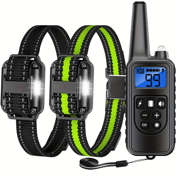 A black dog training collar with a green strap and a handheld remote control is shown.