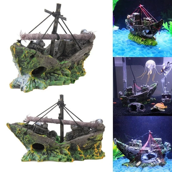 A detailed pirate ship wreck ornament featuring a wooden mast and rigging, set on a mossy rock for an aquarium display.