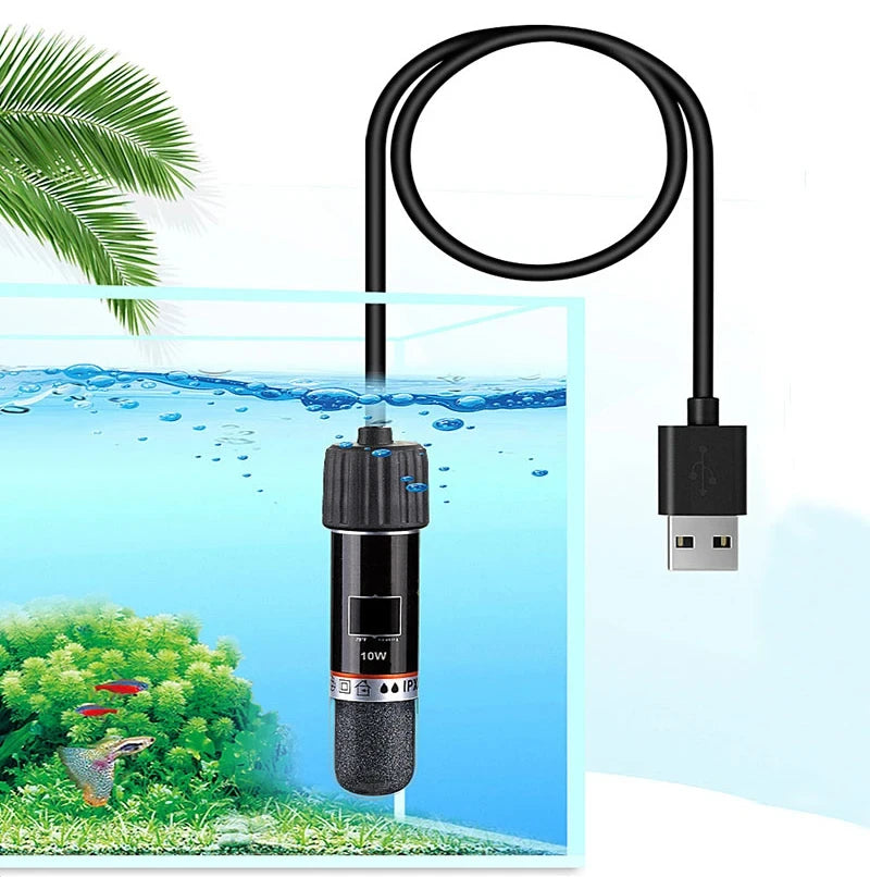 A black USB mini aquarium heater with a coiled wire is shown submerged in clear water near aquatic plants.
