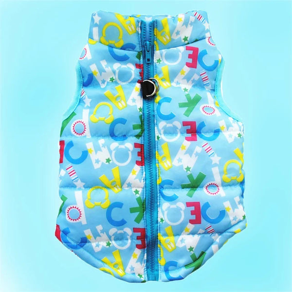 A bright blue and white patterned dog coat with a zipper, featuring colorful letters and shapes.