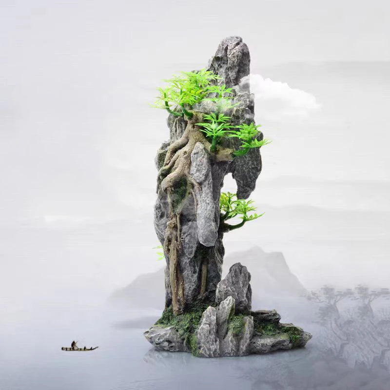 Resin aquarium rockery featuring a cave structure and tree growing on mossy rocks in a misty landscape.