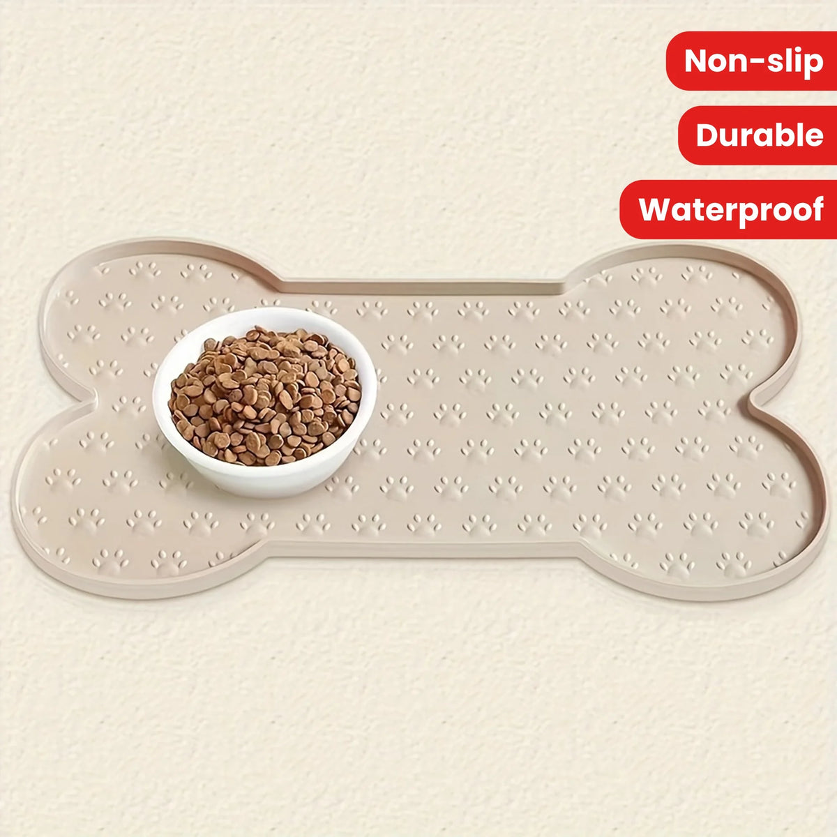 A beige silicone dog feeding mat with raised anti-slip edges and a white bowl filled with seeds.