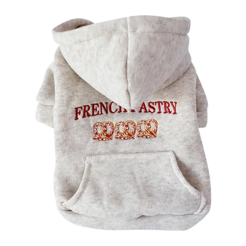 A light gray embroidered hoodie for a small dog featuring the text FRENCH ASTRY
