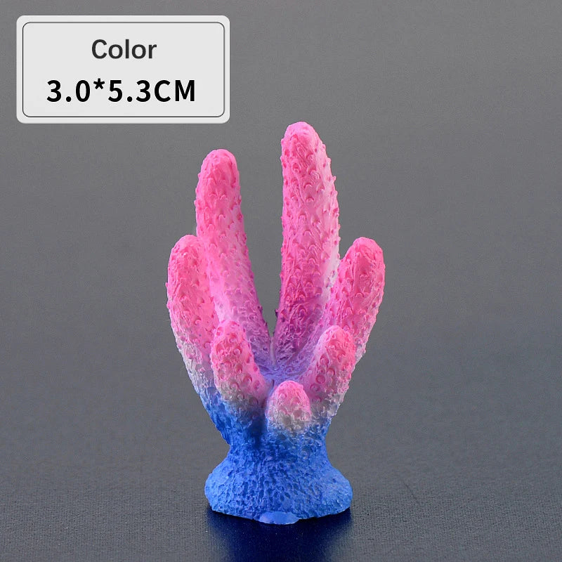 A vibrant pink and blue resin coral decoration with a branching structure.