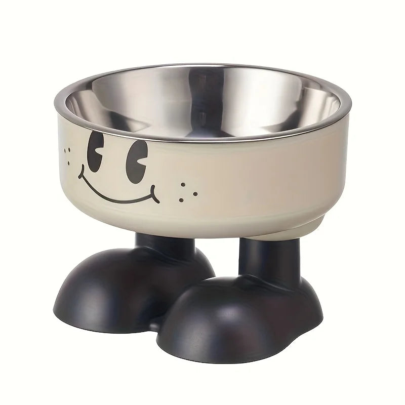 A stainless steel pet feeder bowl with a smiling face and a dark base.