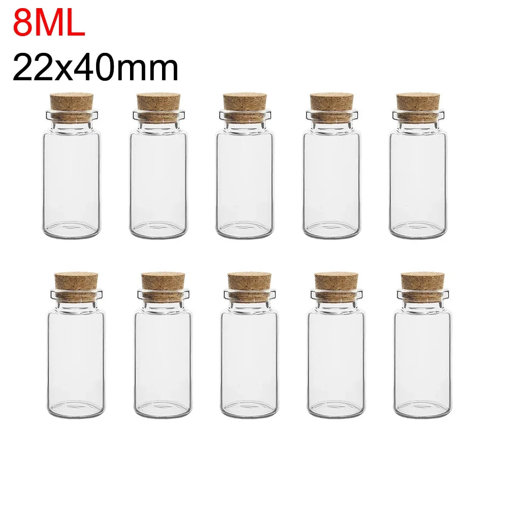 A set of ten mini glass bottles with cork stoppers, measuring 8ml and 22x40mm.