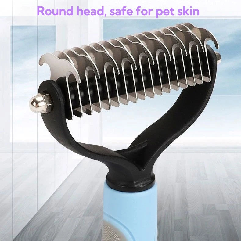 A close-up view of a black stainless steel pet detangling comb with a round head, shown on a light blue device.