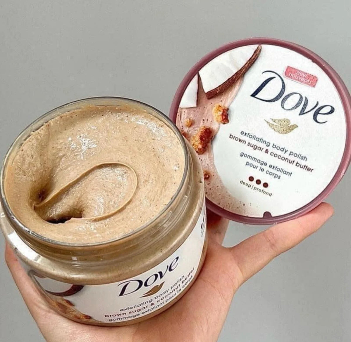 A jar of Dove brown sugar exfoliating body polish with a lid showing the product name and packaging.