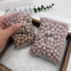 Two clear plastic bags containing granular quartz bio filter balls, one labeled 200G and the other 500G.