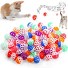 A multi-pack of colorful cat toy balls shaped like jingle bells, including red, green, yellow, and purple.