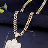 A gold plated last supper medallion necklace featuring a Cuban chain and a cloud pendant.