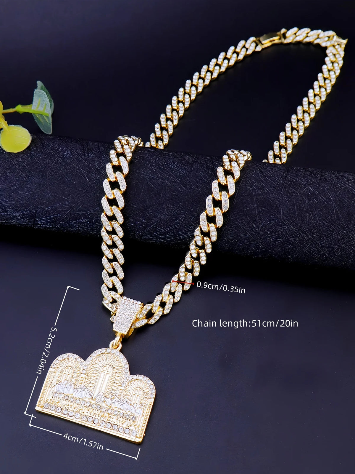 A gold plated last supper medallion necklace featuring a Cuban chain and a cloud pendant.