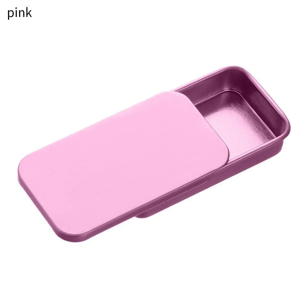 A pink ergonomic parrot training treat dispenser with a lid shown from above.