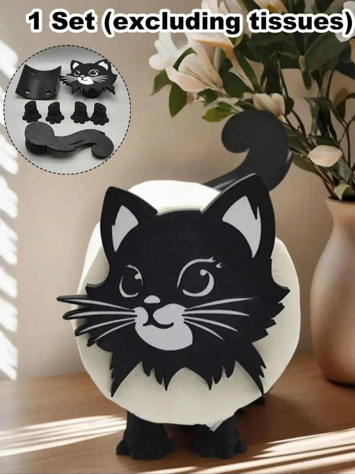 A black cat bathroom roll holder featuring a detailed 3D printed cat face and paw print design.