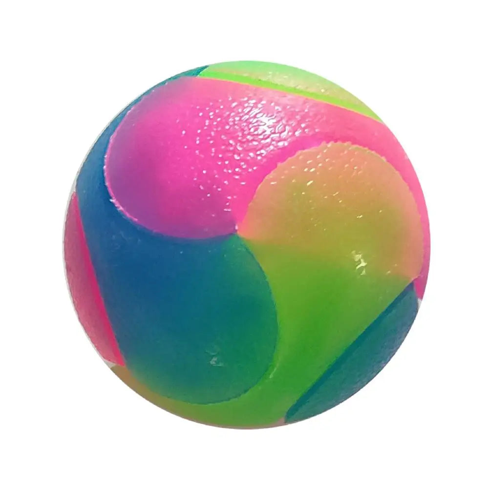 A brightly colored, spherical interactive glowing fetch ball with pink, green, and blue sections.