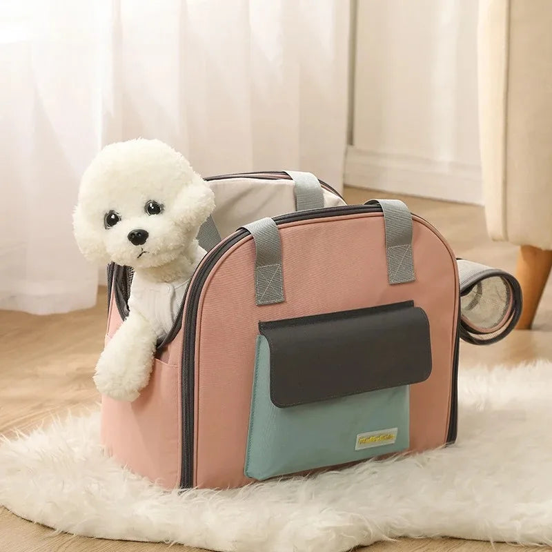 A pink breathable pet carrier backpack with a white fluffy dog head visible on top, resting on a white rug.