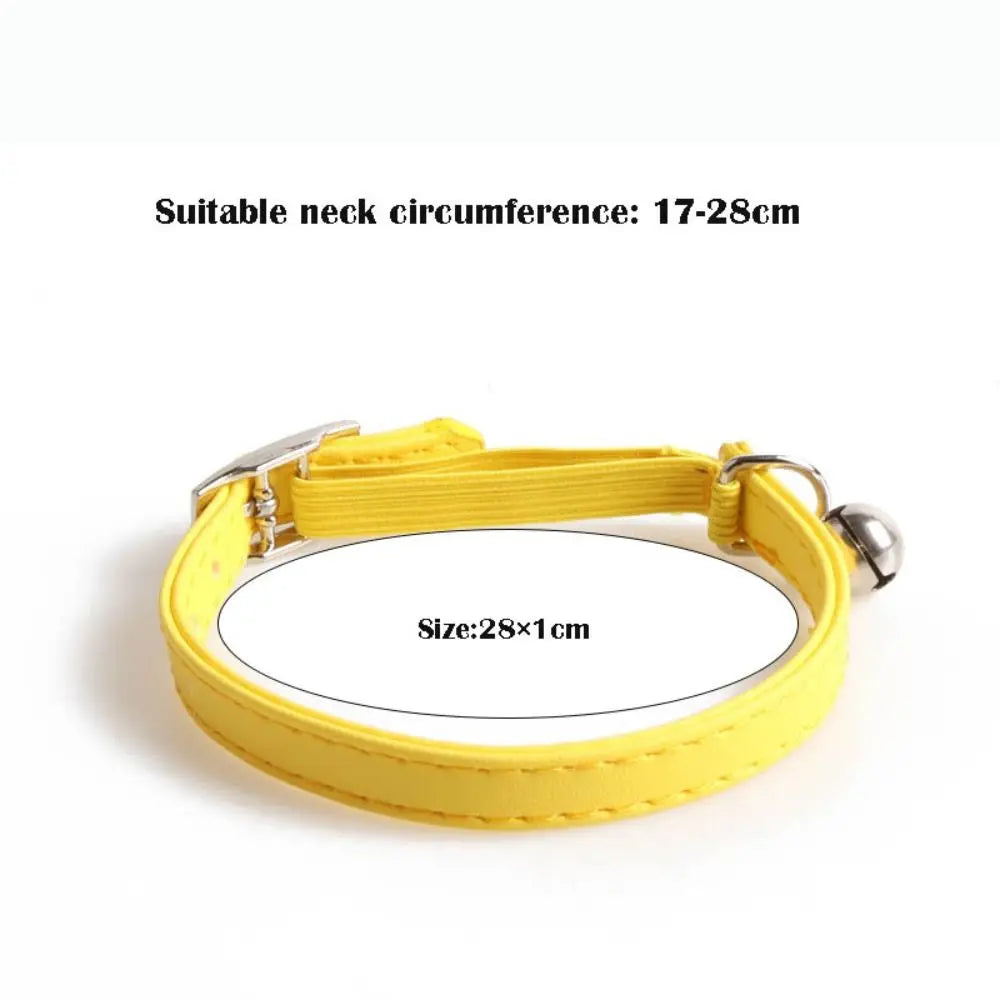 Yellow adjustable cat collar with a bell made of soft PU leather and elastic webbing