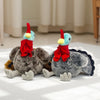 A pair of lifelike plush rooster and hen pillows with red combs and feathers resting on a white surface.