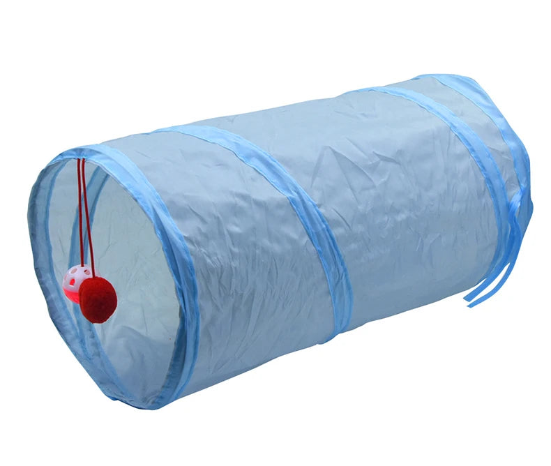 A light blue, cylindrical fabric tunnel for cats with a clear peep hole and a hanging toy.